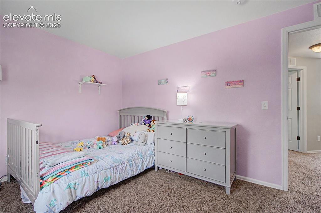 Image 19 of 39: Spacious upper level bedroom