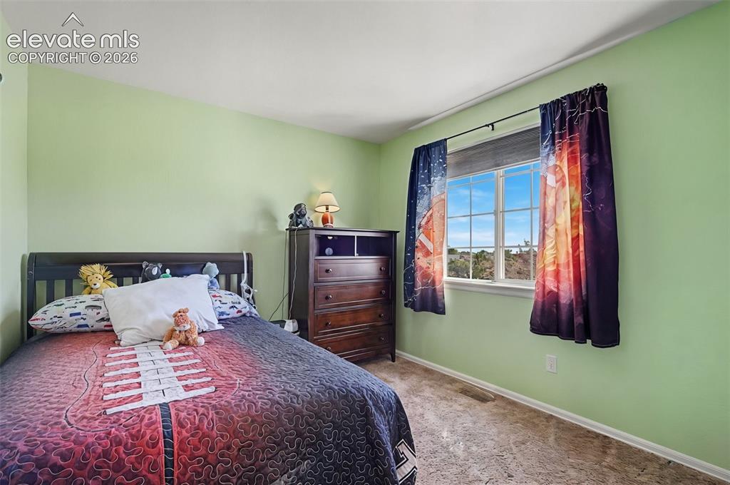 Image 21 of 39: Additional upper level bedroom