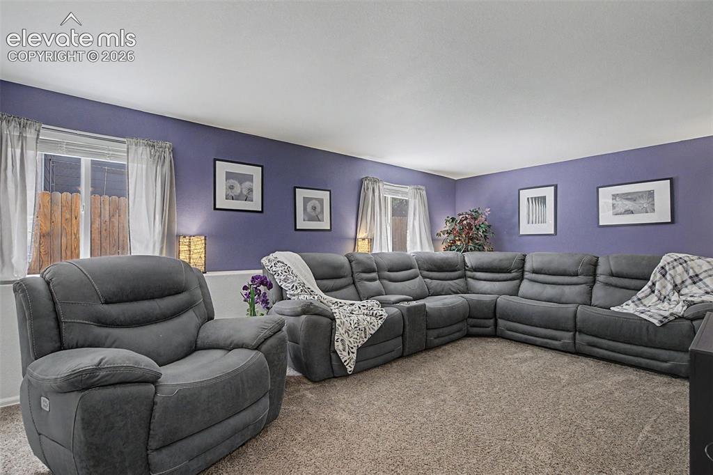 Image 24 of 39: Enjoy your next movie or game night in the family room