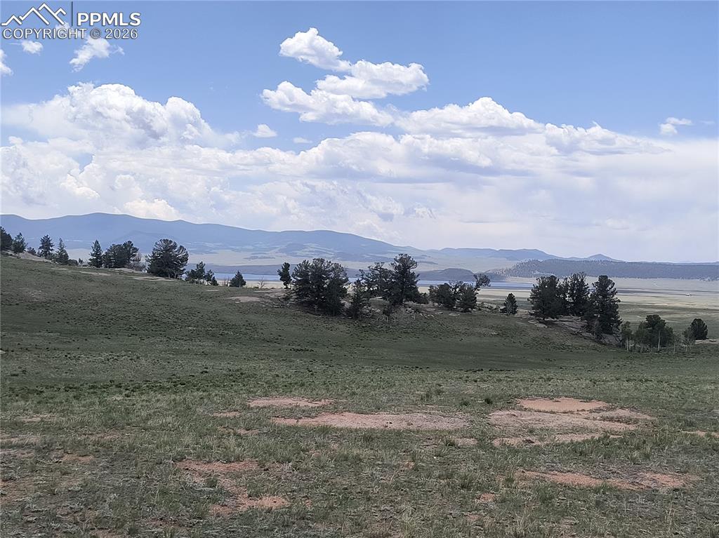 Image 4 of 20: View of mountain background with rural landscape