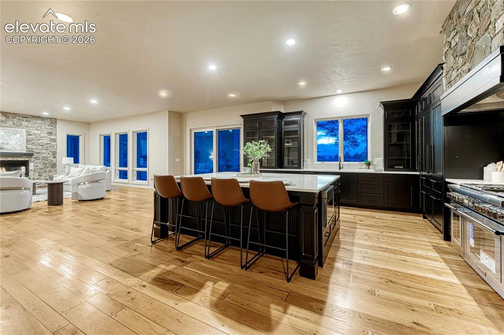 Image 9 of 48: Luxury abounds, with newly finished cherry flooring and fresh paint.