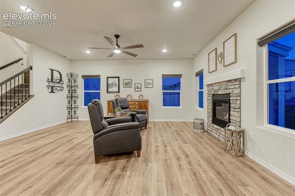 Image 12 of 49: Cozy up to the gas fireplace