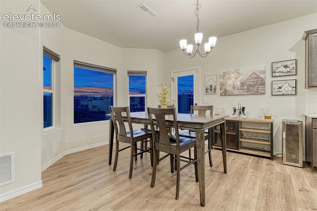 Image 15 of 49: Bay window and walkout