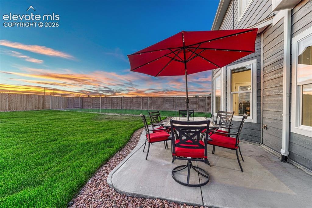 Image 8 of 49: Extended back patio to 28x10