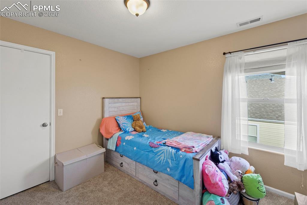 Image 21 of 34: Bedroom