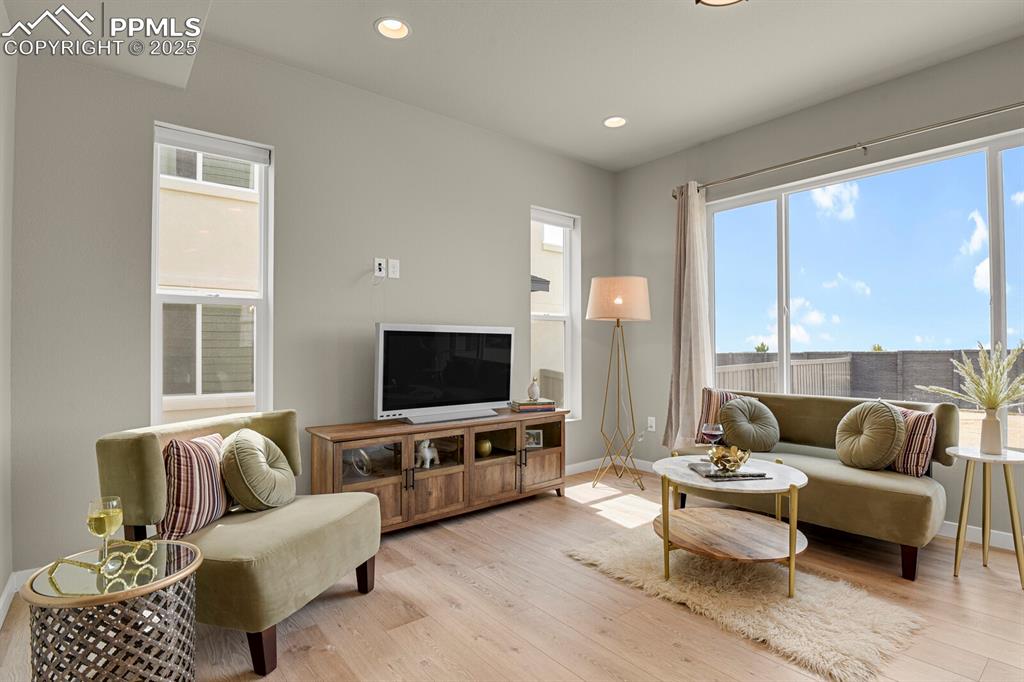 Image 8 of 32: Light and bright living room with an abundance of light coming in