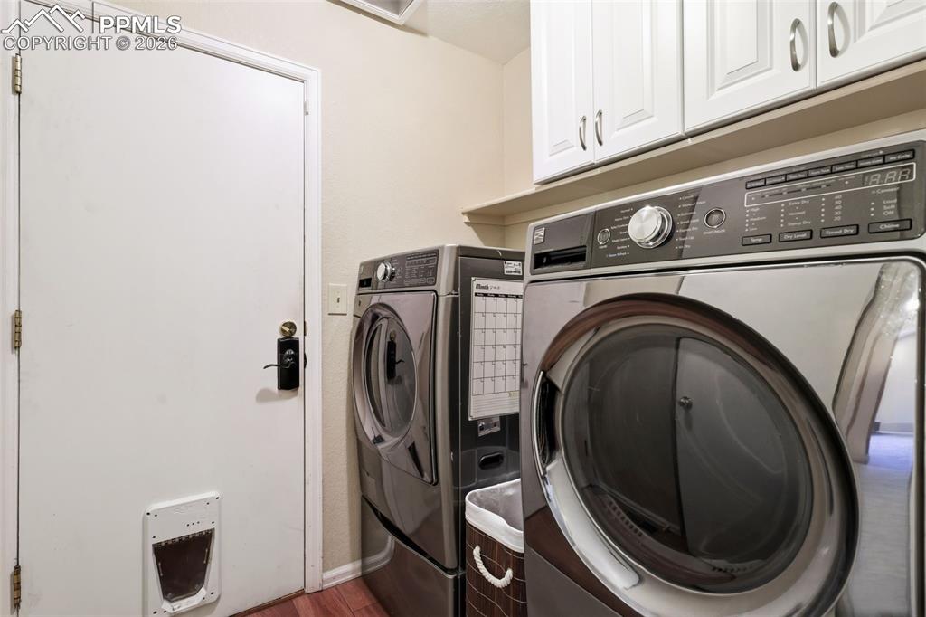 Image 12 of 29: Main level laundry