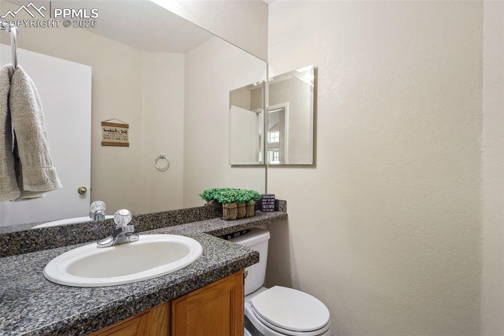 Image 13 of 29: Main level half bath