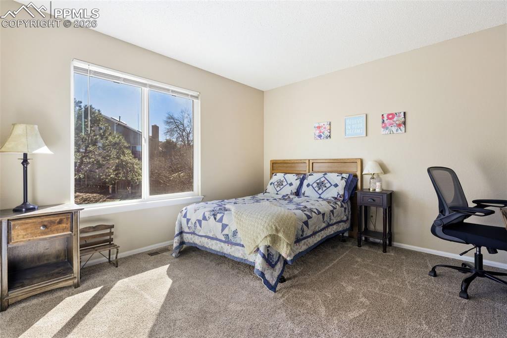 Image 14 of 29: Upstairs bedroom