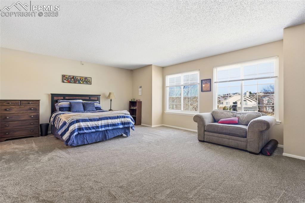 Image 15 of 29: Upstairs bedroom