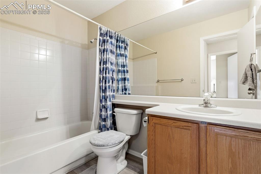 Image 16 of 29: Upstairs jack-and-jill bathroom