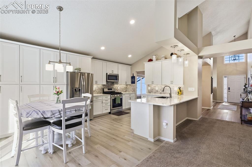 Image 3 of 29: Beautiful remodeled kitchen and open floor plan