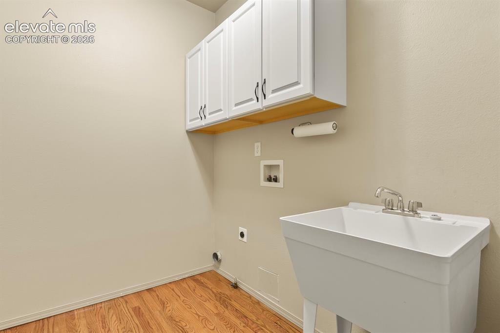 Image 39 of 50: Spacious Main Level Laundry room with Utility Sink