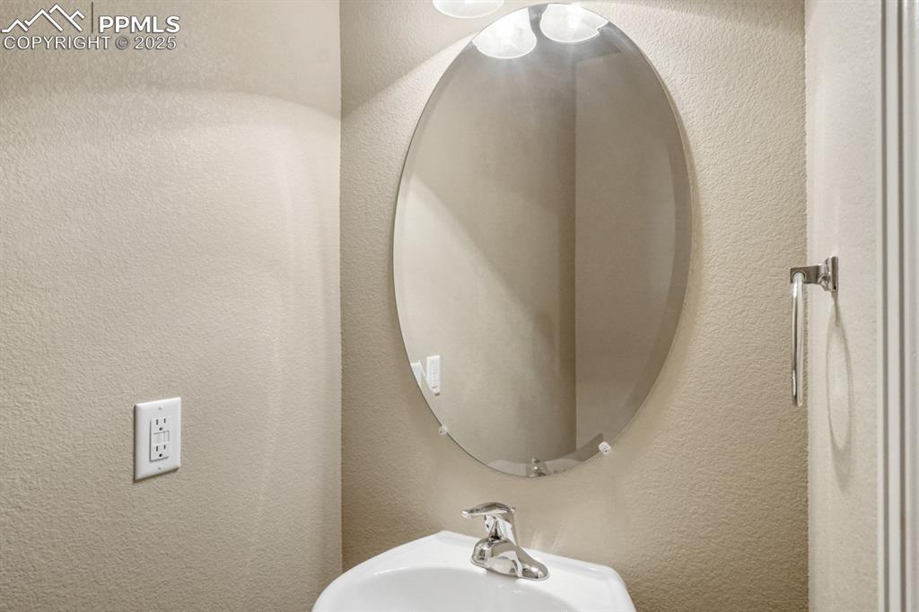 Image 6 of 18: Bathroom with a textured wall