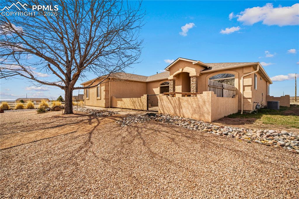 Caption: Beautiful setting and low maintenance stucco