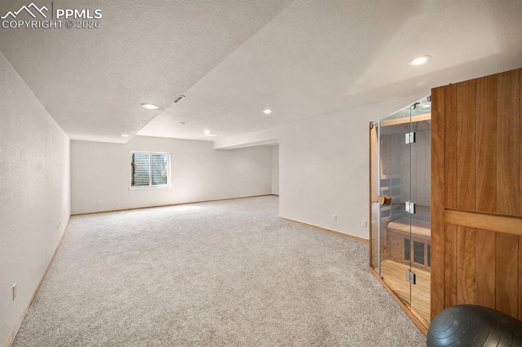 Image 13 of 46: Large basement family room