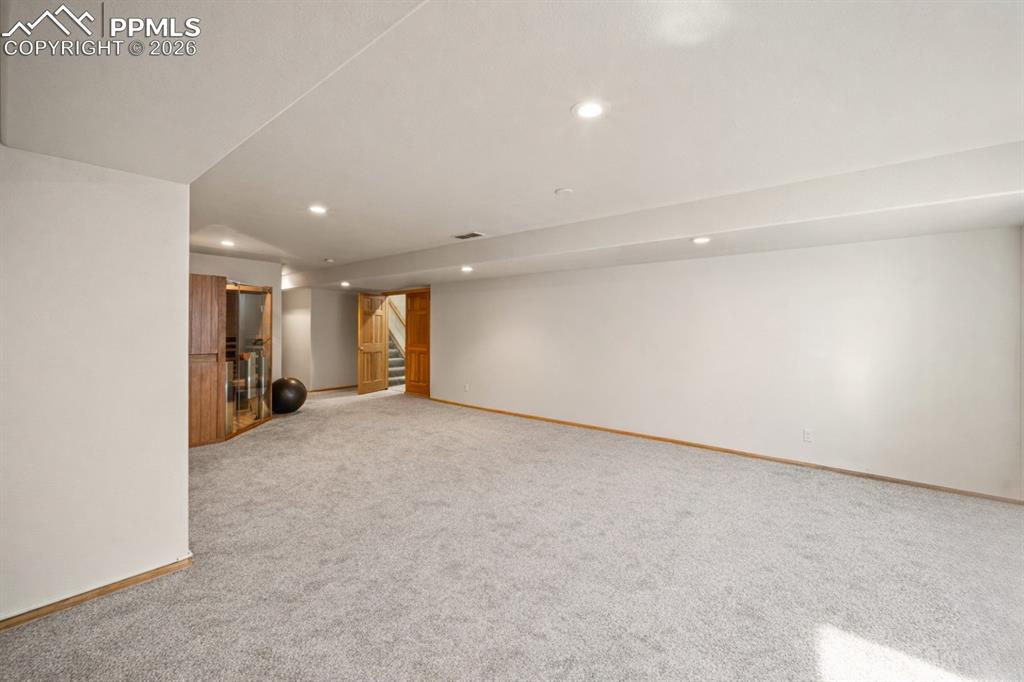 Image 14 of 46: Large Basement family room