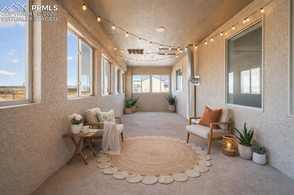 Image 19 of 46: Shown virtually staged Sunroom 