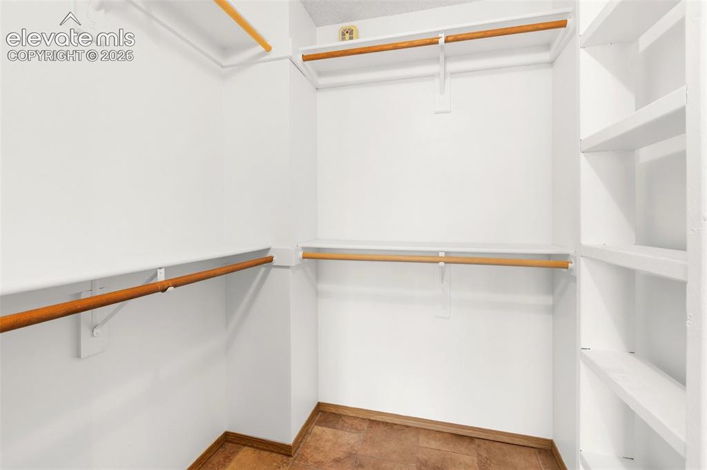 Image 19 of 26: Walk-In Closet 