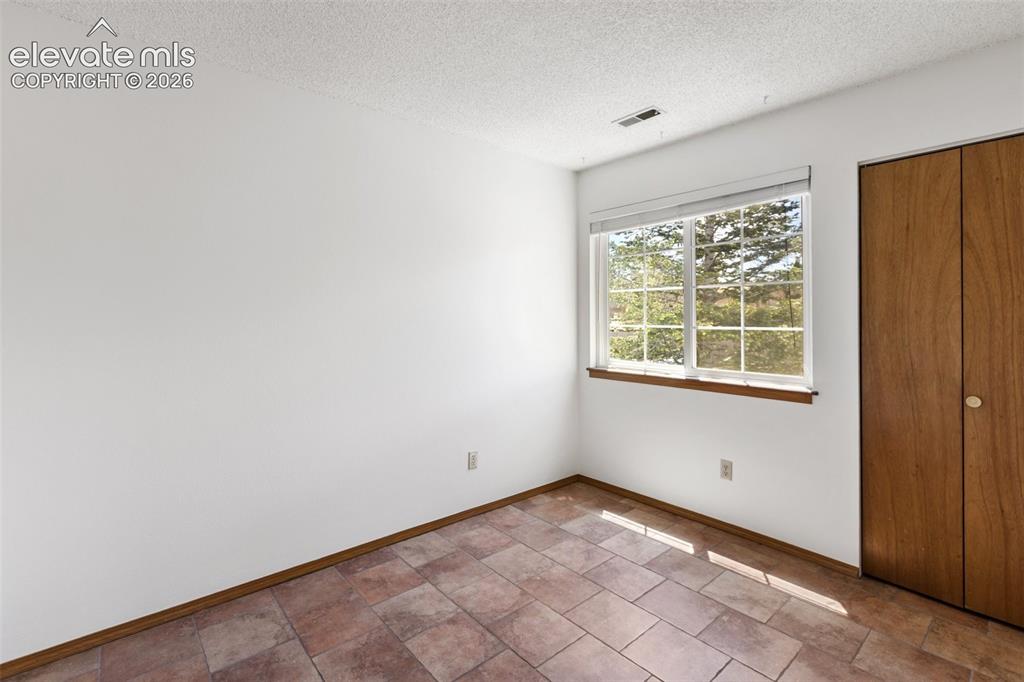 Image 20 of 26: Second Bedroom 