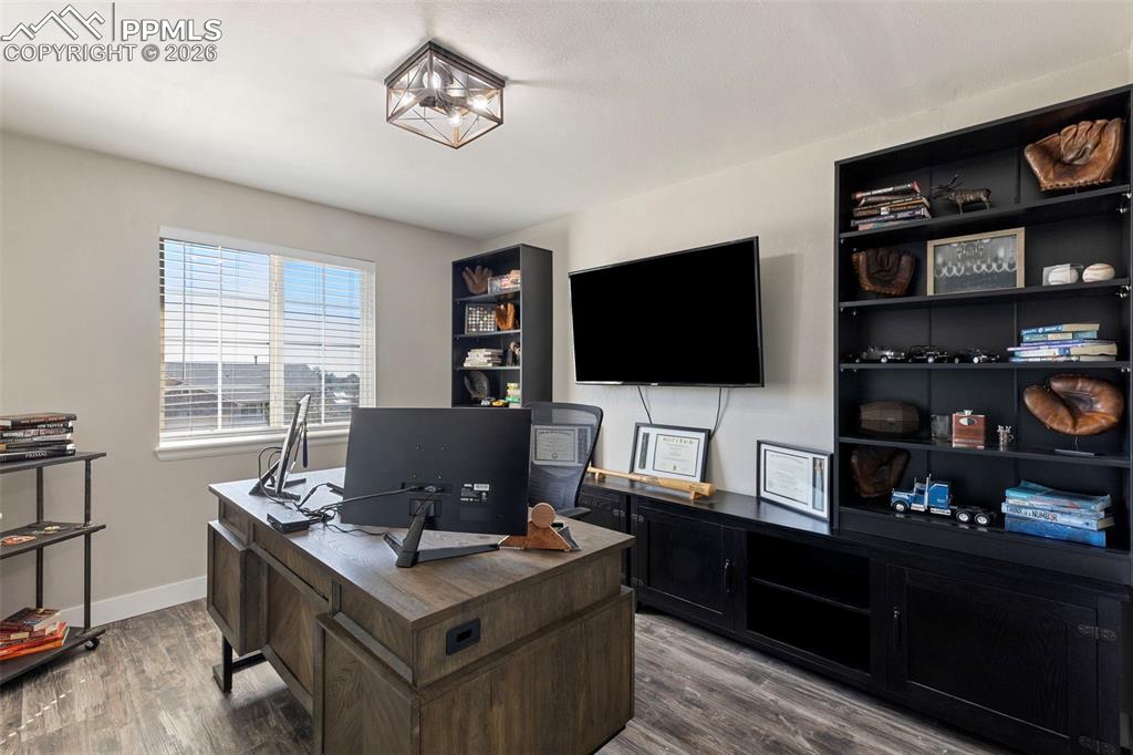 Image 16 of 30: Upper Bedroom used as an office 