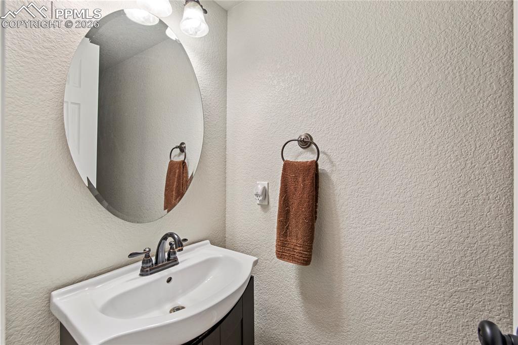 Image 10 of 27: 1/2 bath on the main level