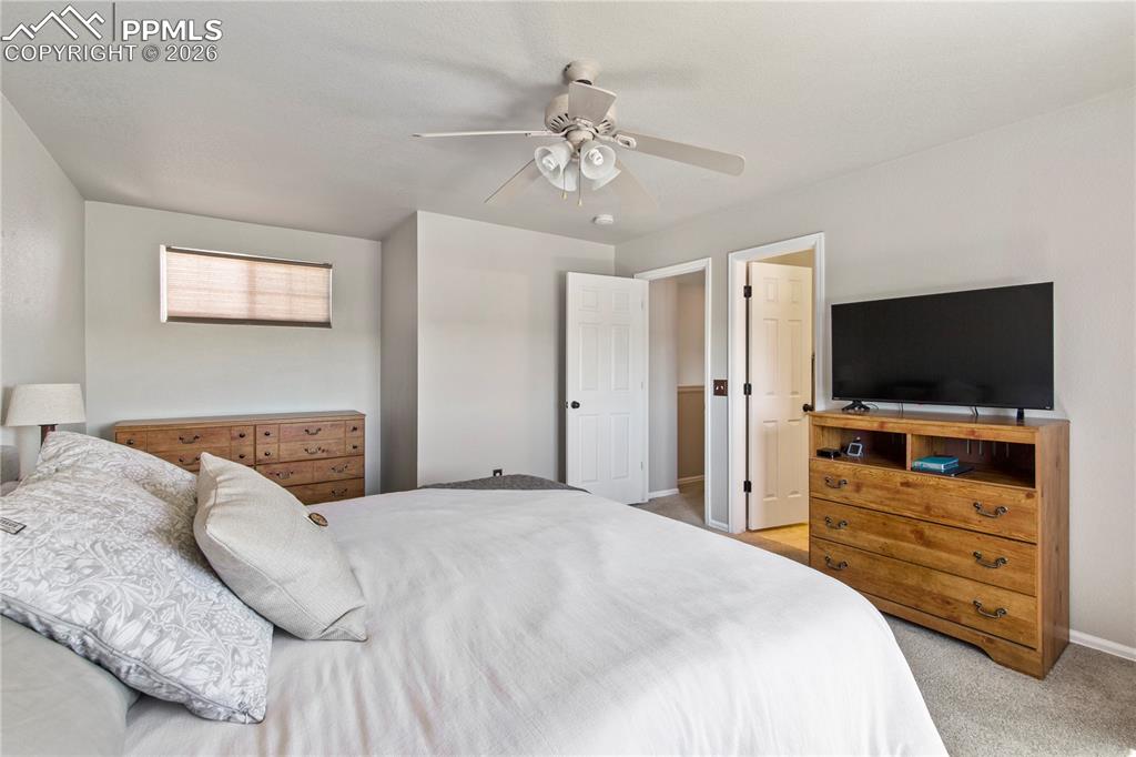 Image 12 of 27: Primary bedroom has a separate attached full bathroom