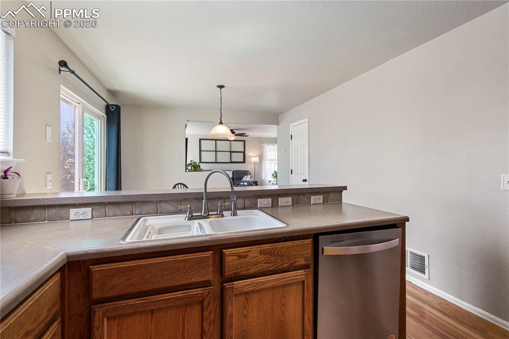 Image 9 of 27: View from kitchen to dining area