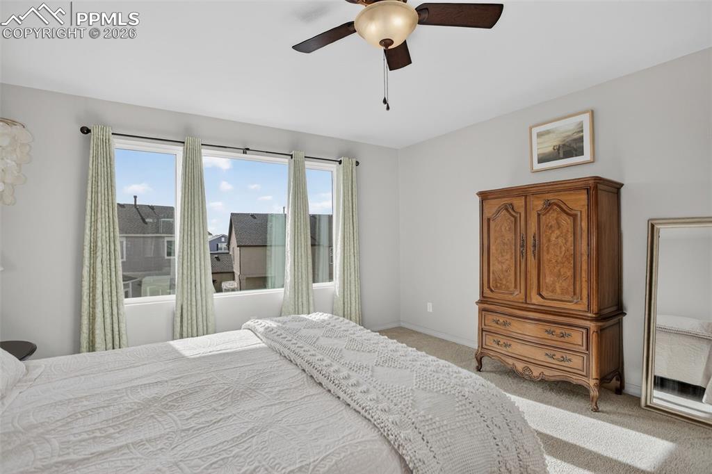 Image 14 of 46: Master has lots of natural light