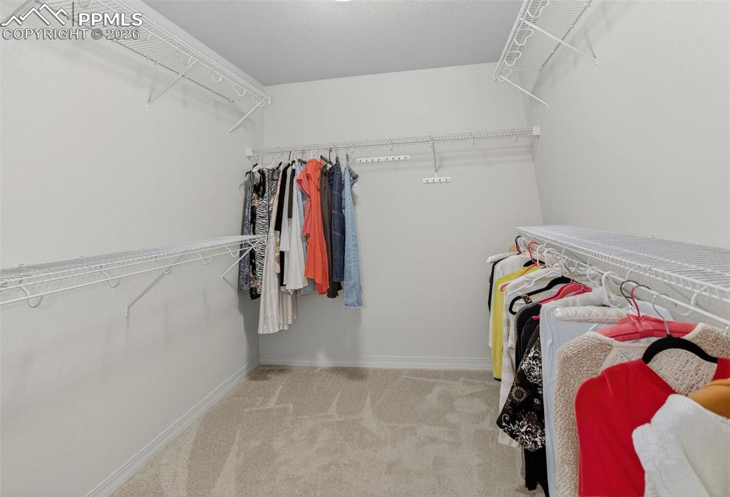 Image 18 of 46: Master walk in closet
