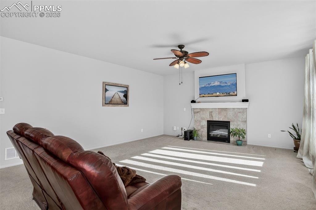 Image 19 of 46: Living room gas fireplace