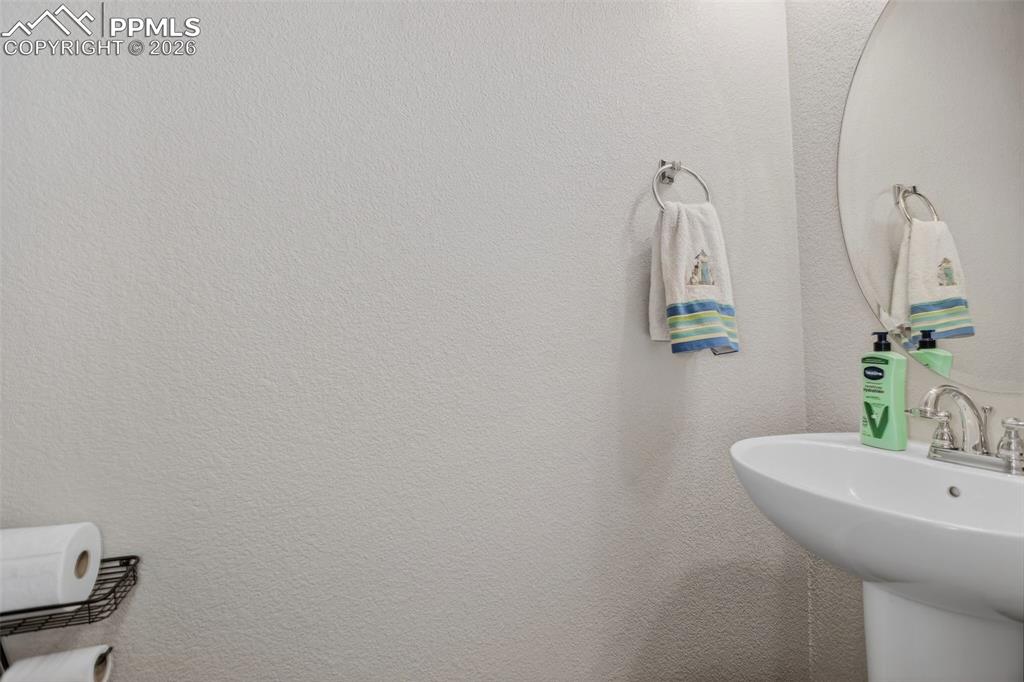 Image 23 of 46: Main level powder room