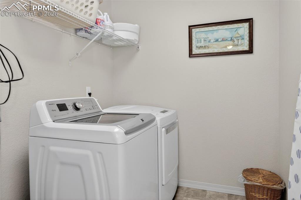 Image 26 of 46: Upper level laundry room