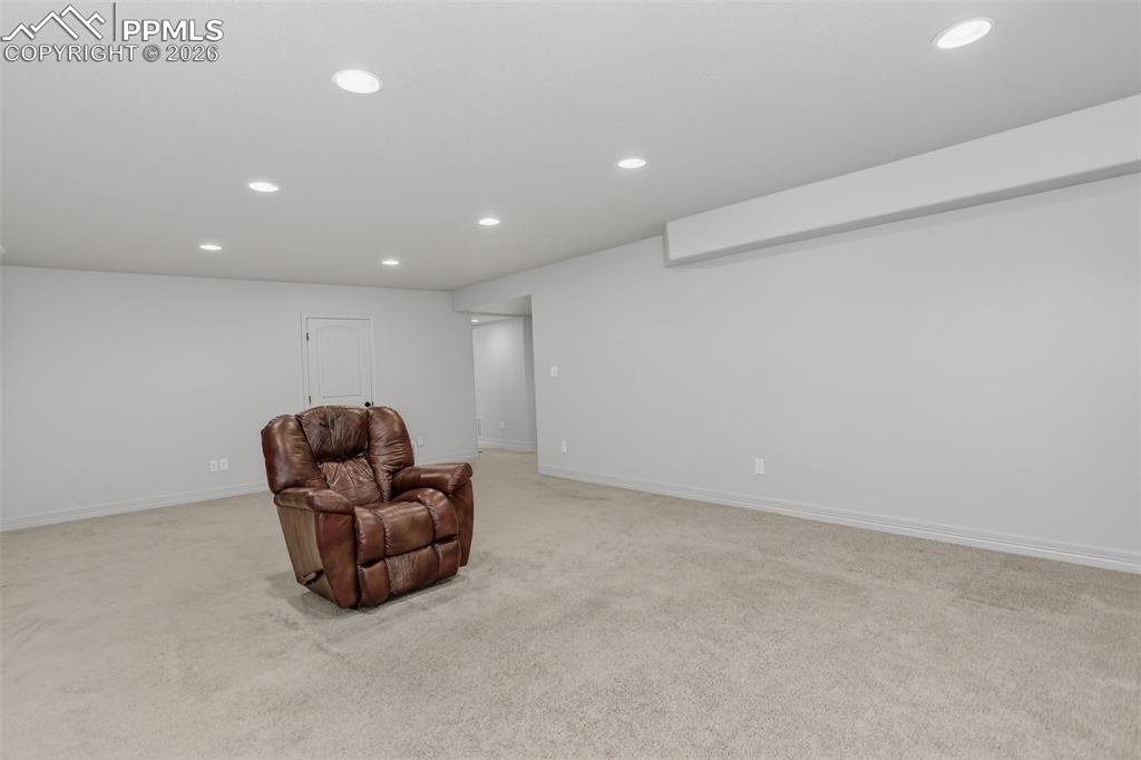 Image 34 of 46: Family room on basement level