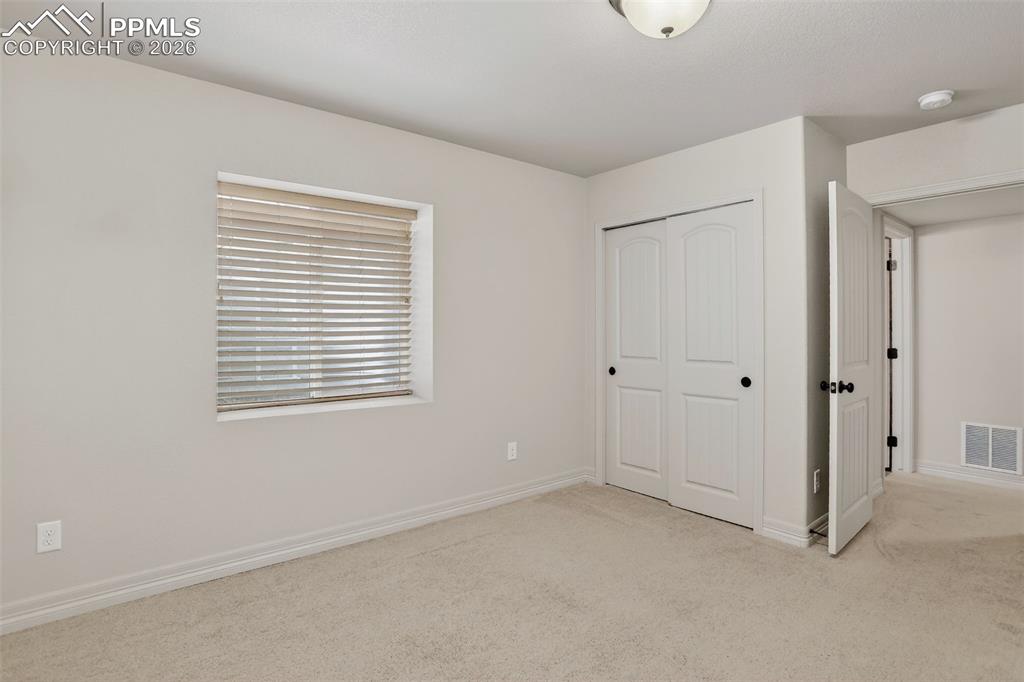 Image 36 of 46: Bedroom 5 in basement