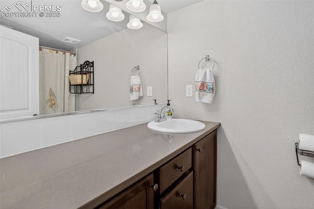 Image 37 of 46: Full bathroom in basement