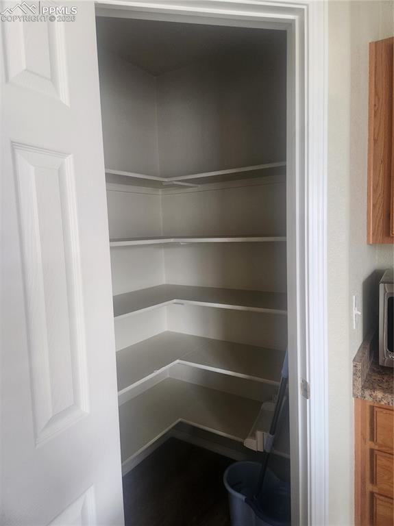 Image 14 of 25: View of large kitchen pantry