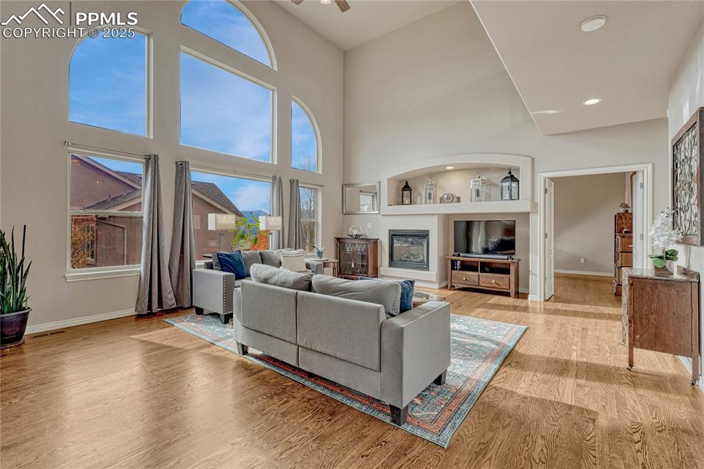 Image 11 of 48: Cathedral ceiling and multiple windows make a statement!