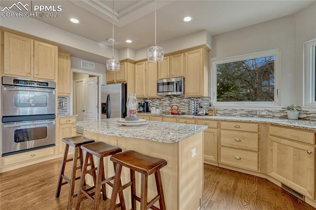 Image 18 of 48: ...double oven, island and pantry. 