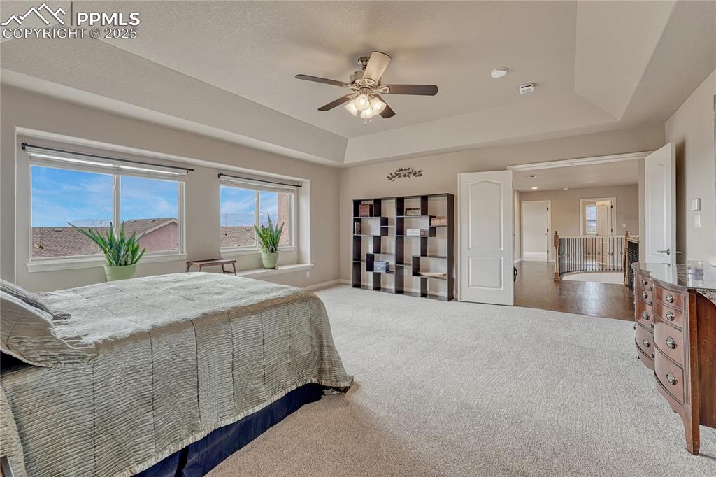 Image 23 of 48: Primary bedroom has incredible Pikes Peak views! 