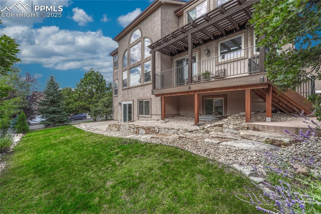 Image 35 of 48: Follow the flagstone walkway to the...