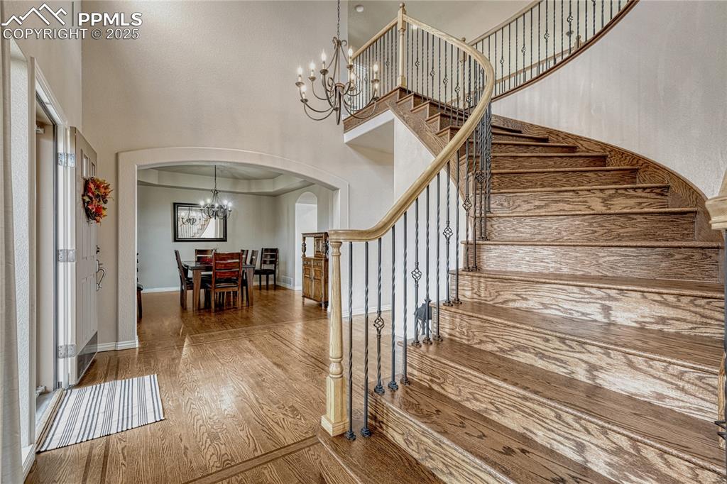 Image 5 of 48: 2-story entry and grand staircase.