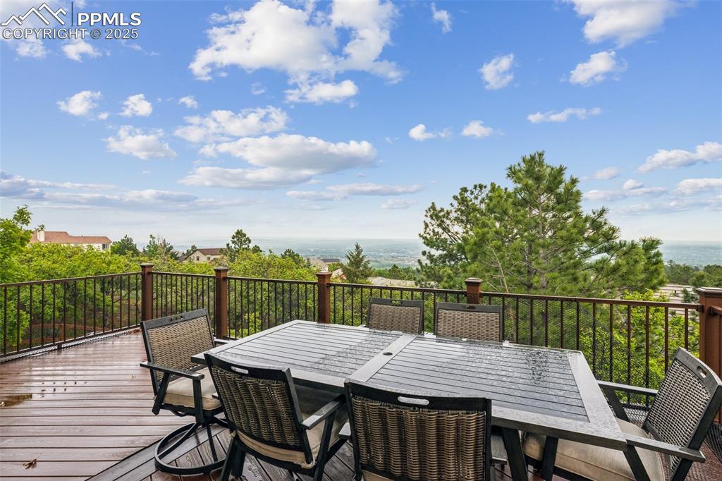 Image 20 of 43: Wooden deck featuring outdoor dining area
