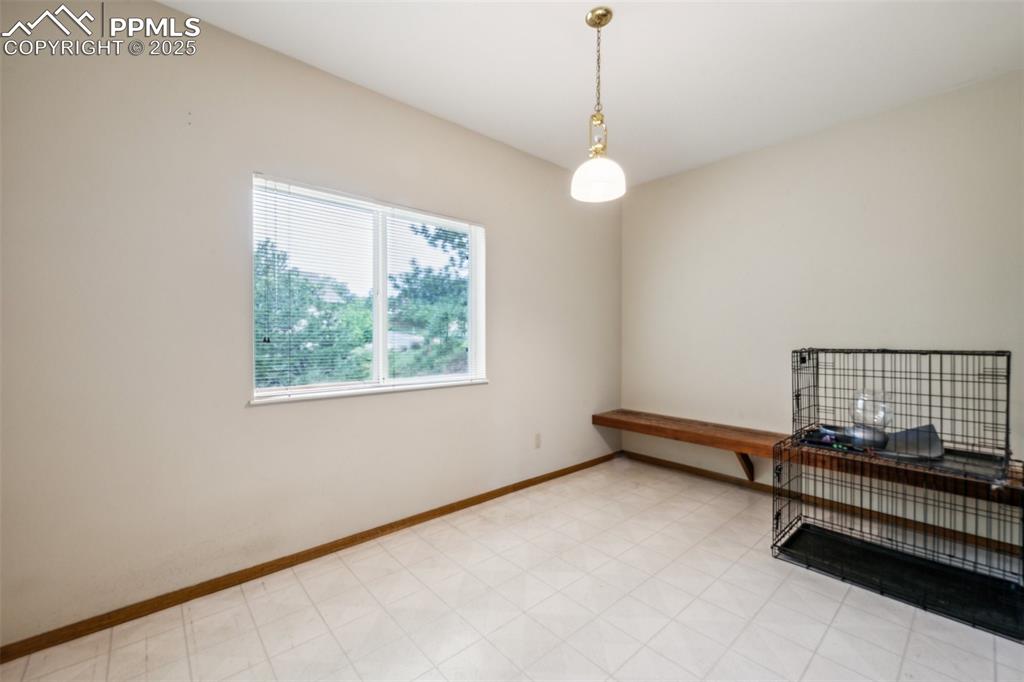 Image 39 of 43: Spare room featuring baseboards