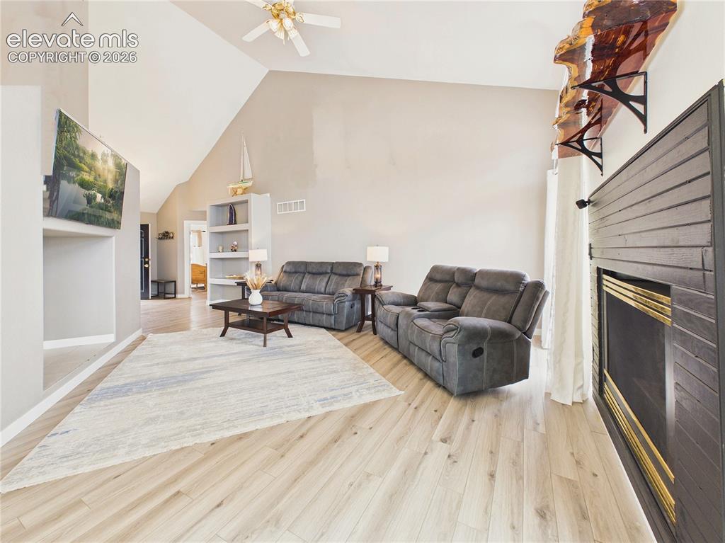 Image 20 of 50: Vaulted ceilings and abundant natural light enhance the spacious feel of th