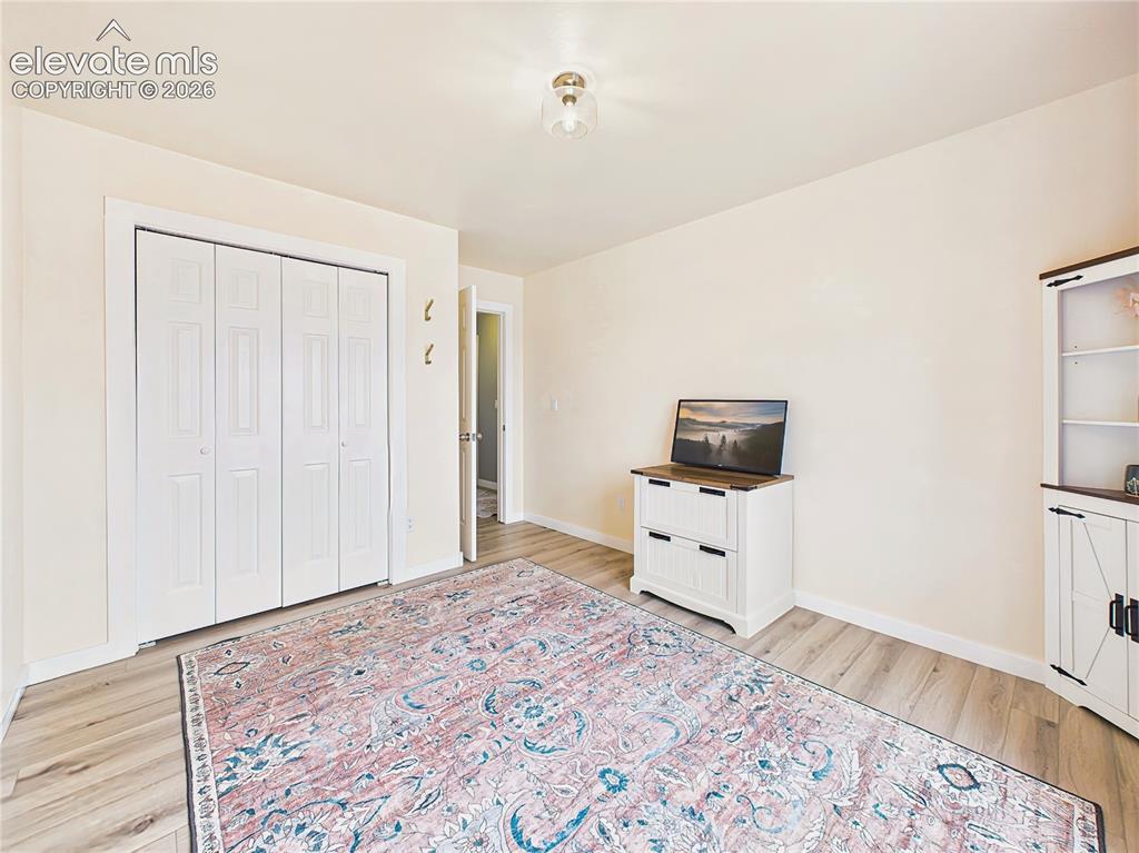 Image 29 of 50: Versatile Main level bedroom 3 provides generous space for guests, a home o