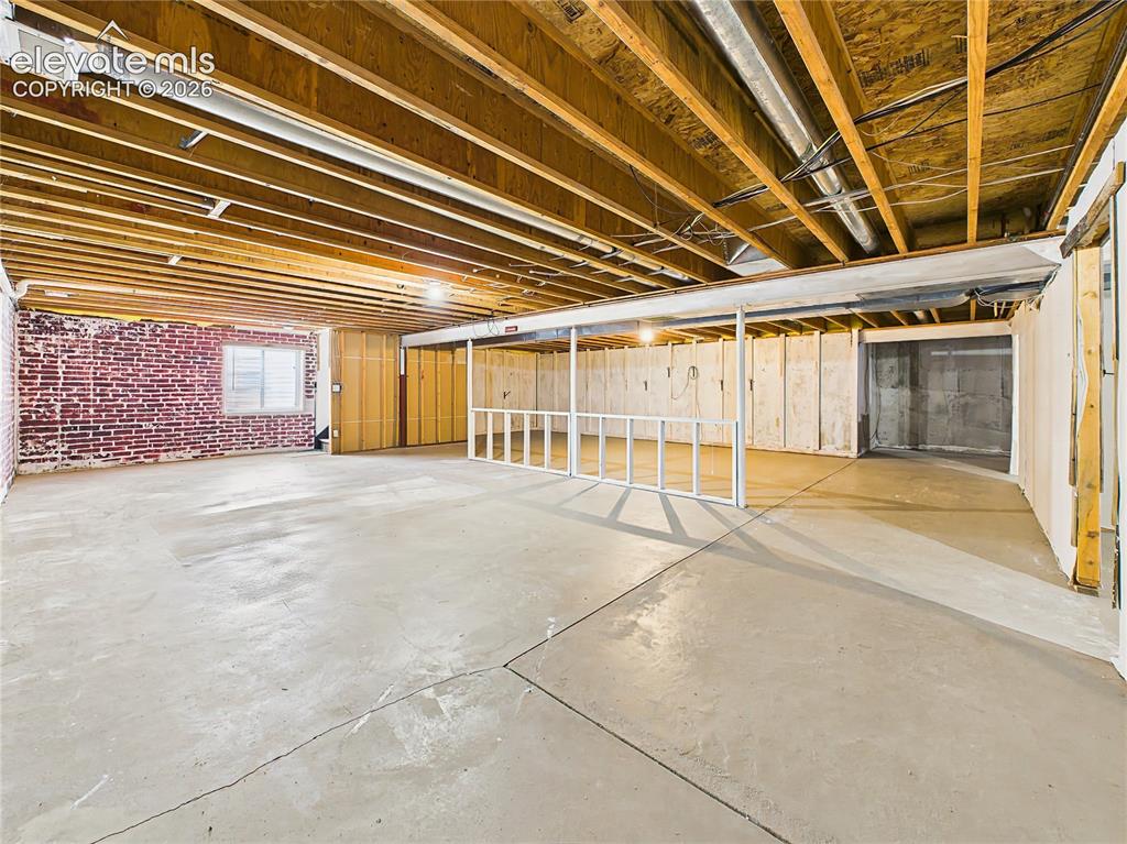 Image 34 of 50: Expansive full basement provides abundant storage and endless possibilities