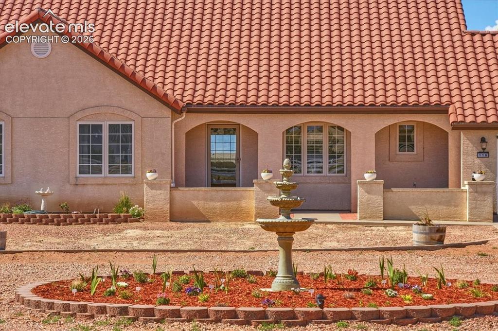 Image 40 of 50: Large windows and patio access create a seamless connection between indoor