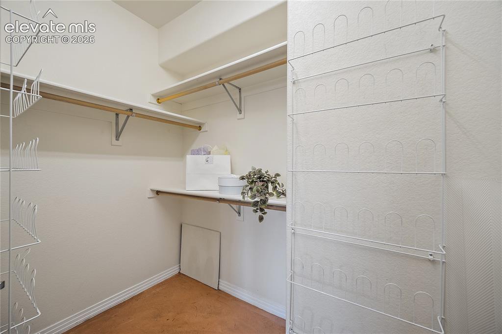 Image 19 of 40: Walk in closet