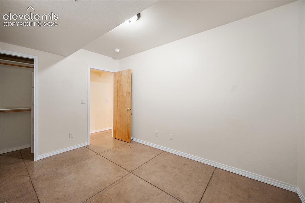 Image 33 of 40: 2nd basement bedroom